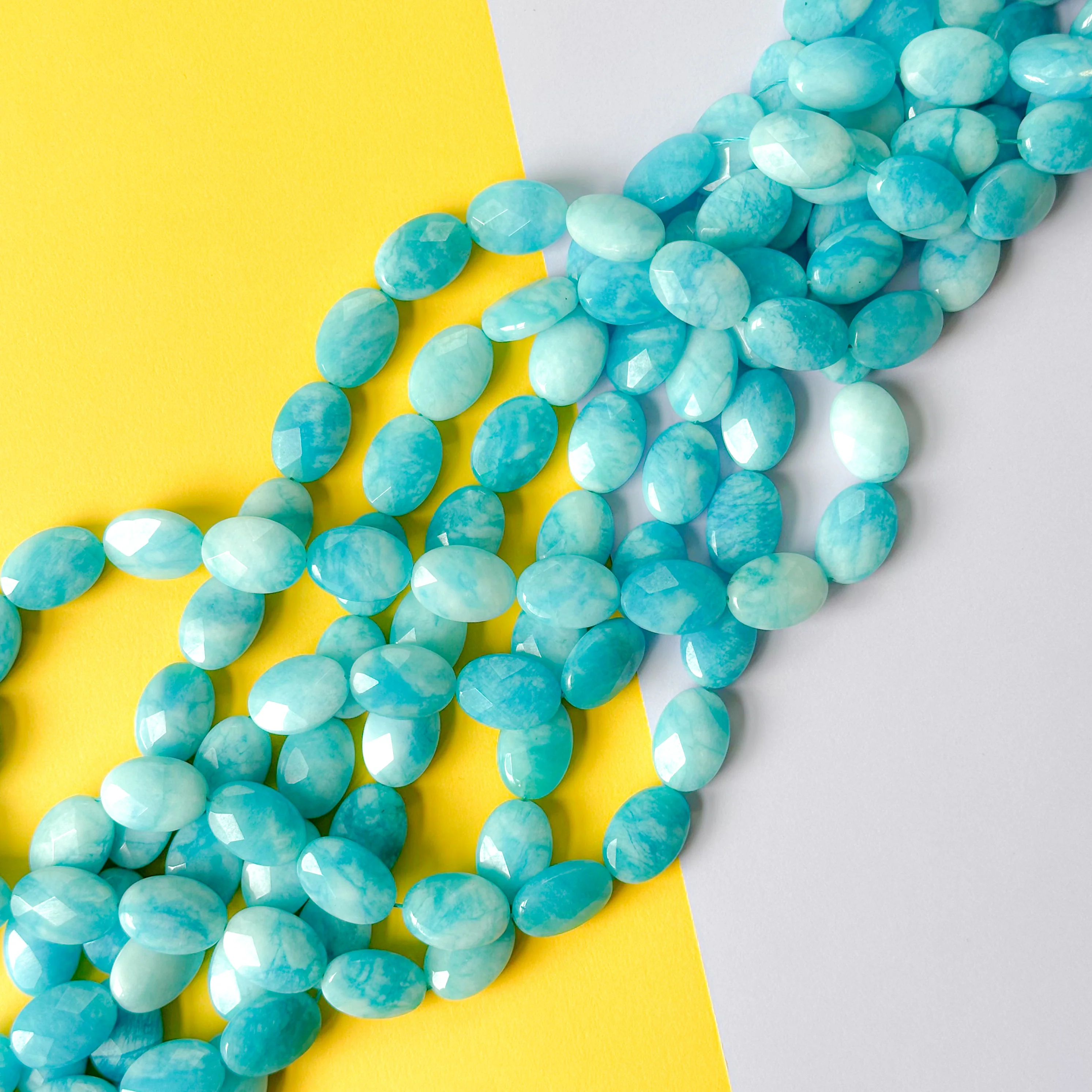 14mm Aqua Blue Dyed Calcite Faceted Oval Strand - Image 2