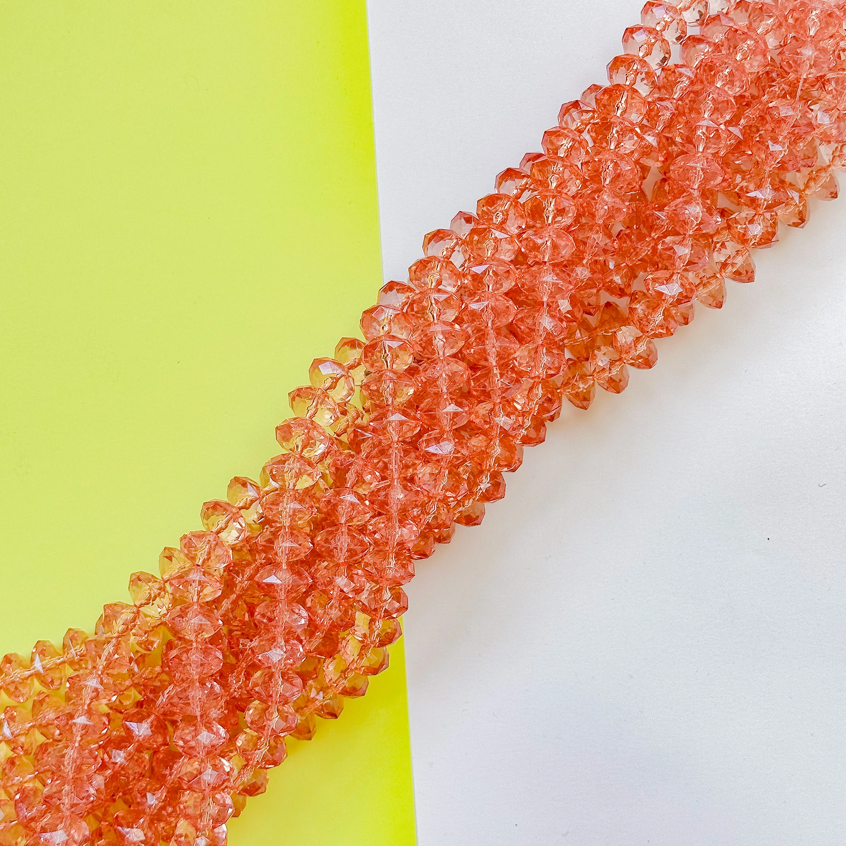 14mm Light Coral Resin Faceted Rondelle Strand