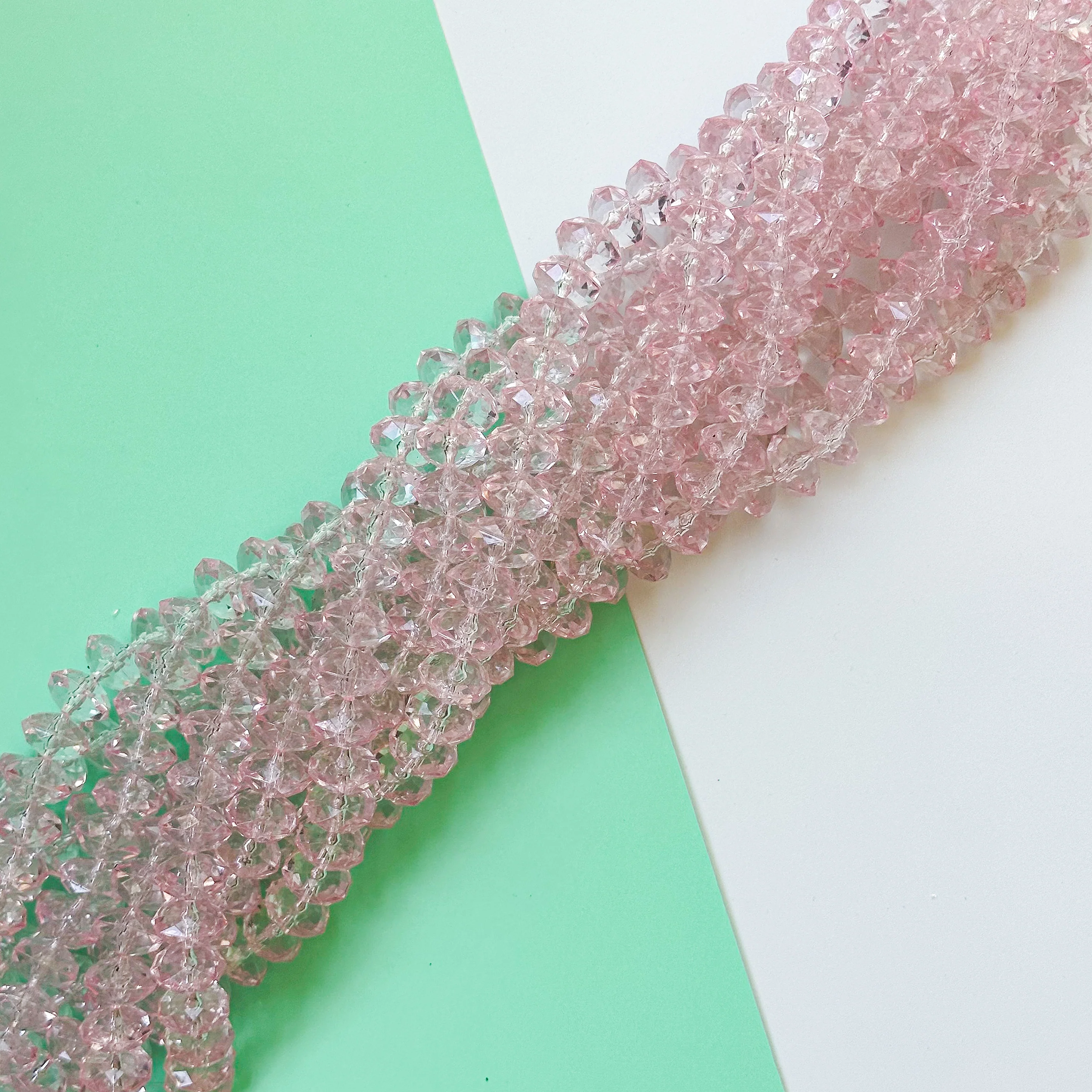 14mm Light Pink Resin Faceted Rondelle Strand