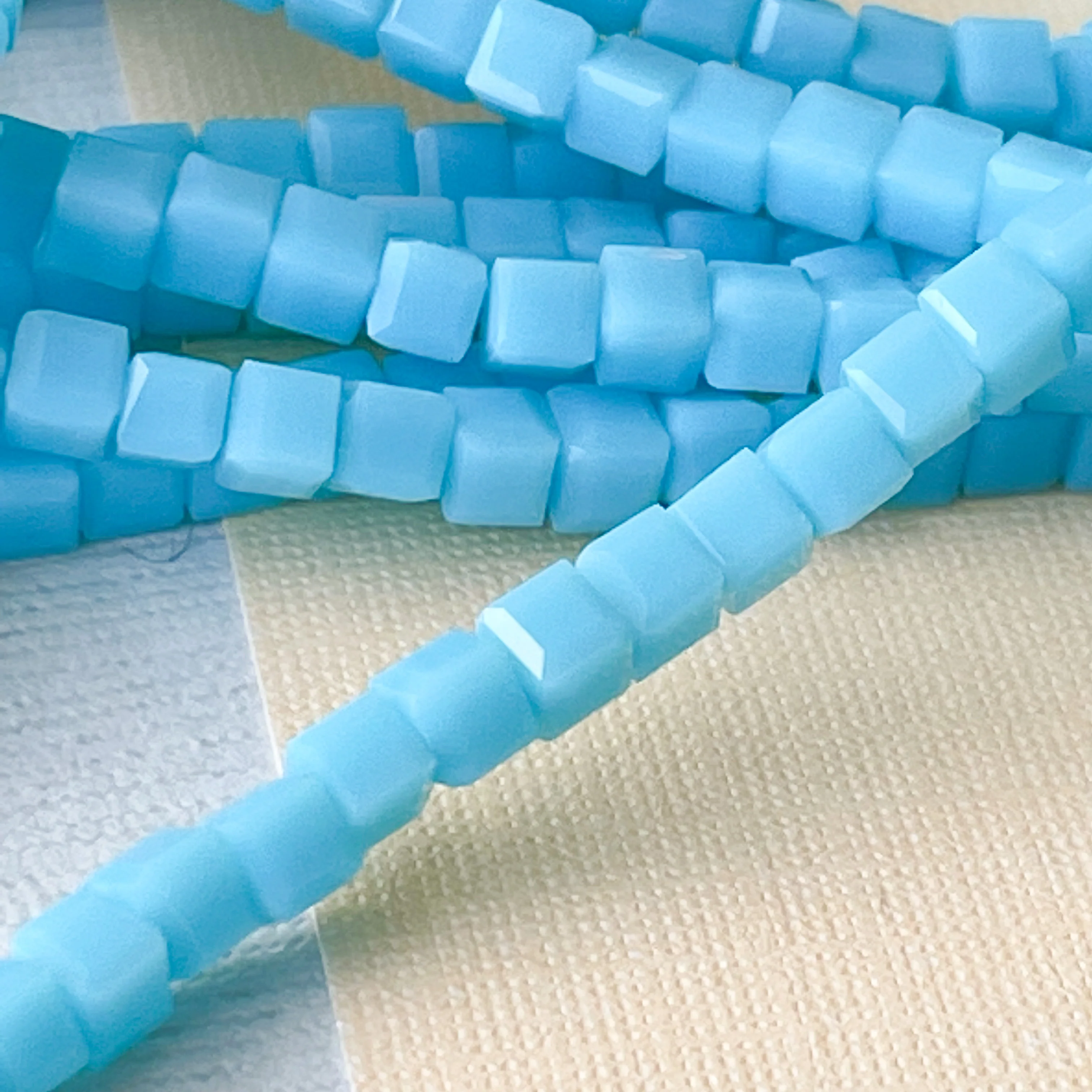 3mm Sky Blue Faceted Cube Crystal Strand - Image 3