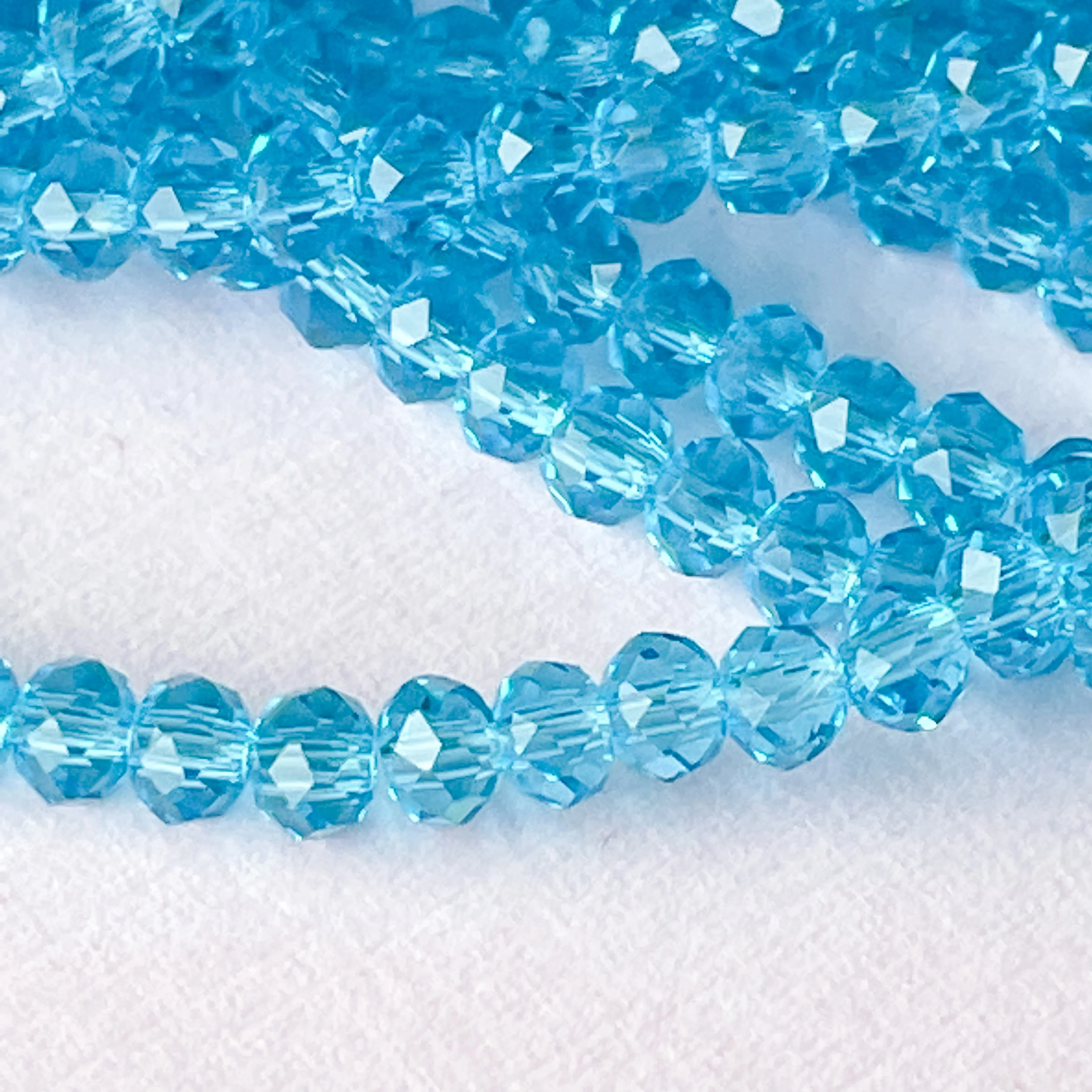 3mm Translucent Pool Blue Faceted Chinese Crystal Rondelle - Image 3