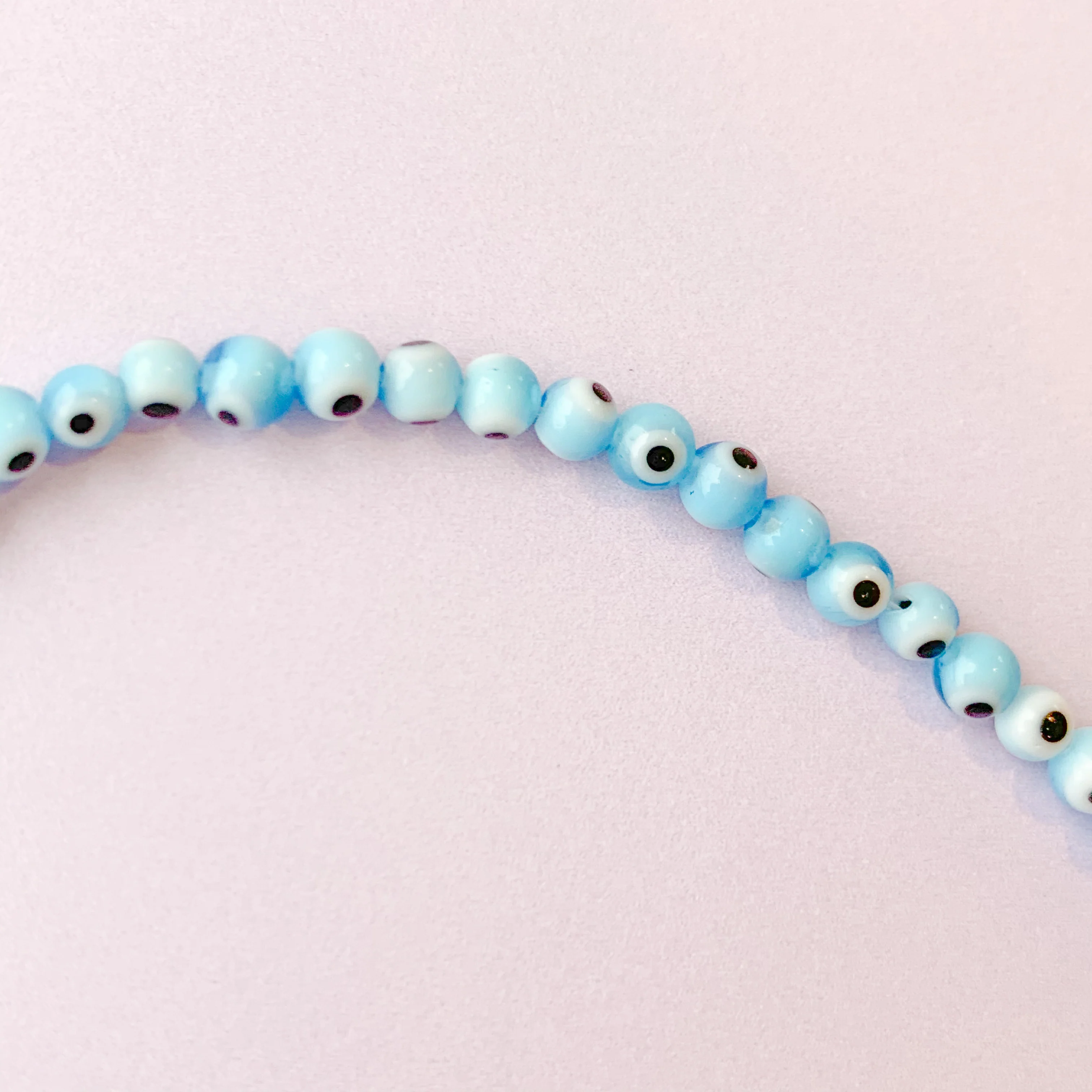 4mm Light Blue Evil Eye Rounds Strand - Image 3