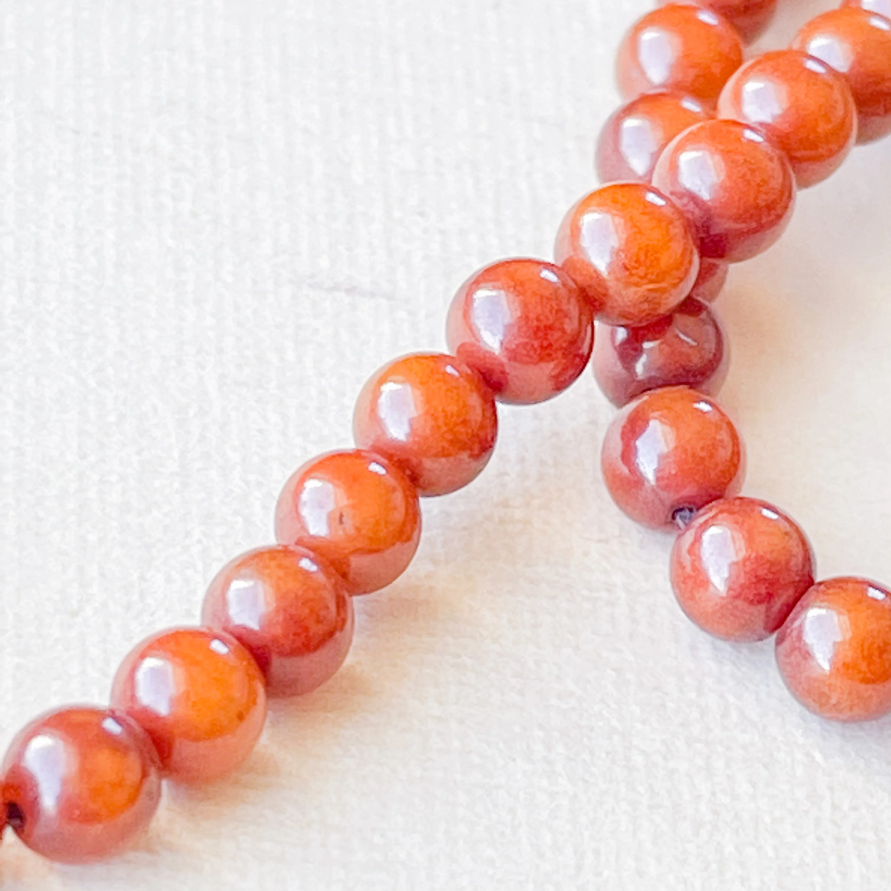 4mm Smooth Bamboo Coral Rounds Strand - Image 3