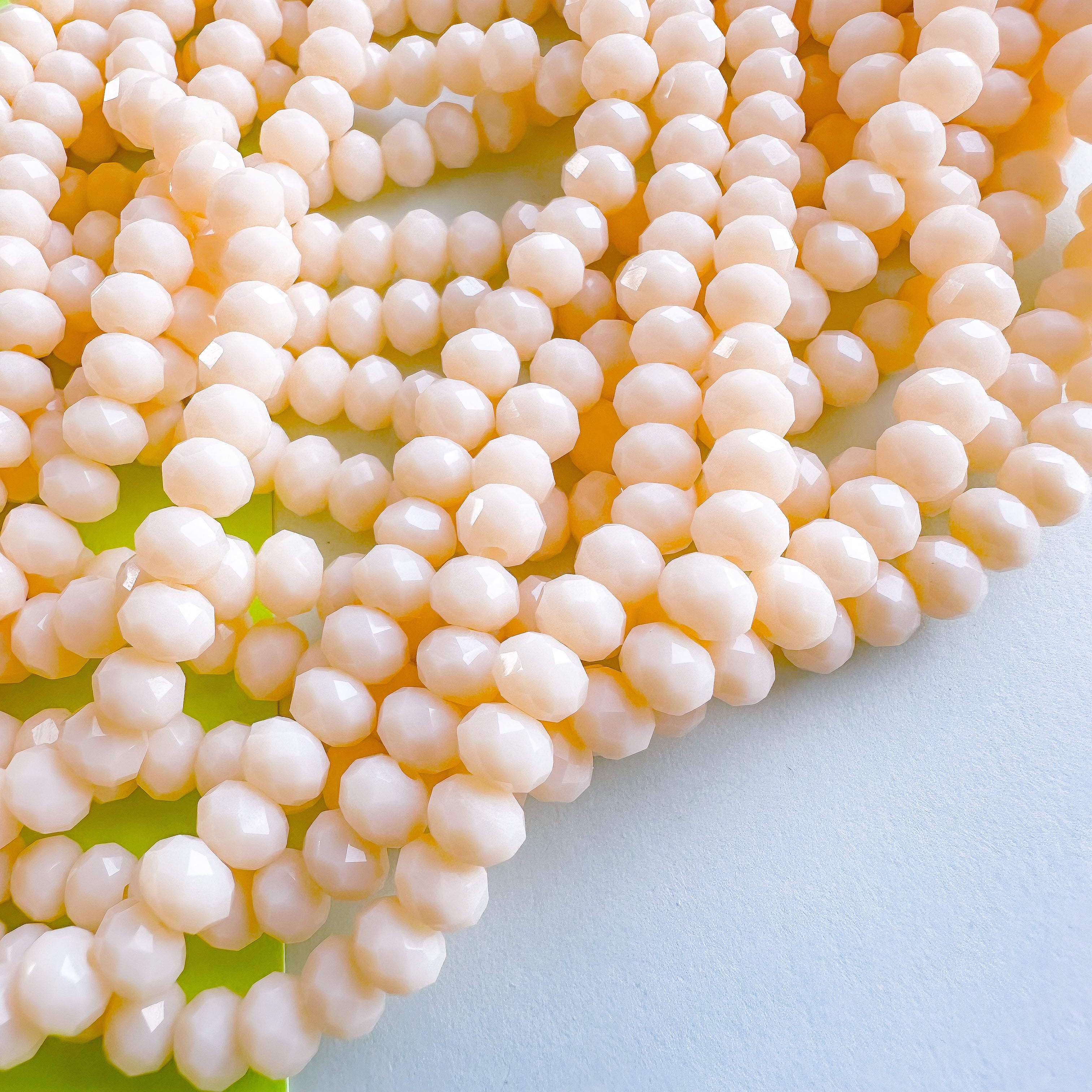 6mm Opaque Light Peach Faceted Crystal Rondelle Strand - Image 3