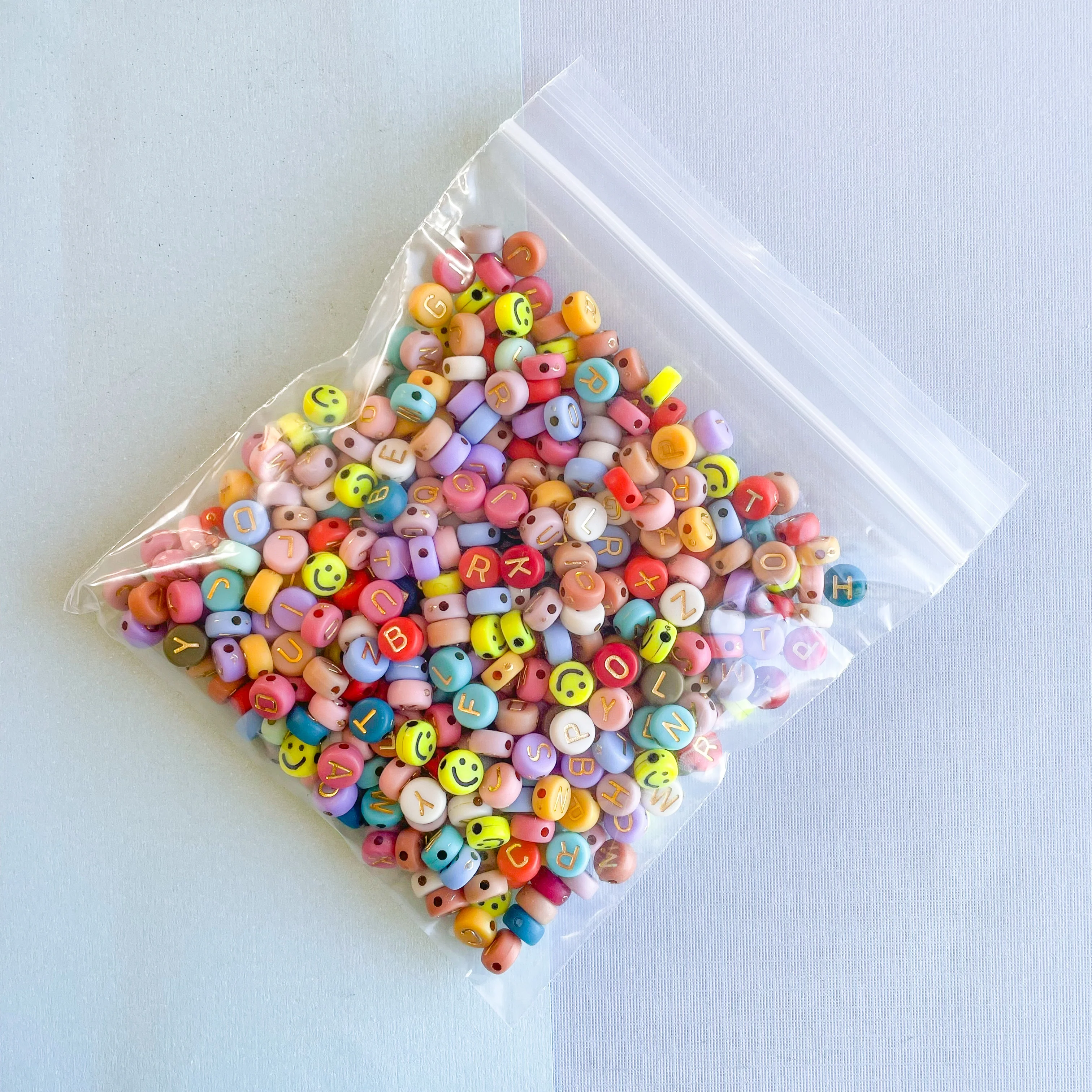 7mm Muted Rainbow Gold Letter Acrylic Coin Bead Pack - Image 5