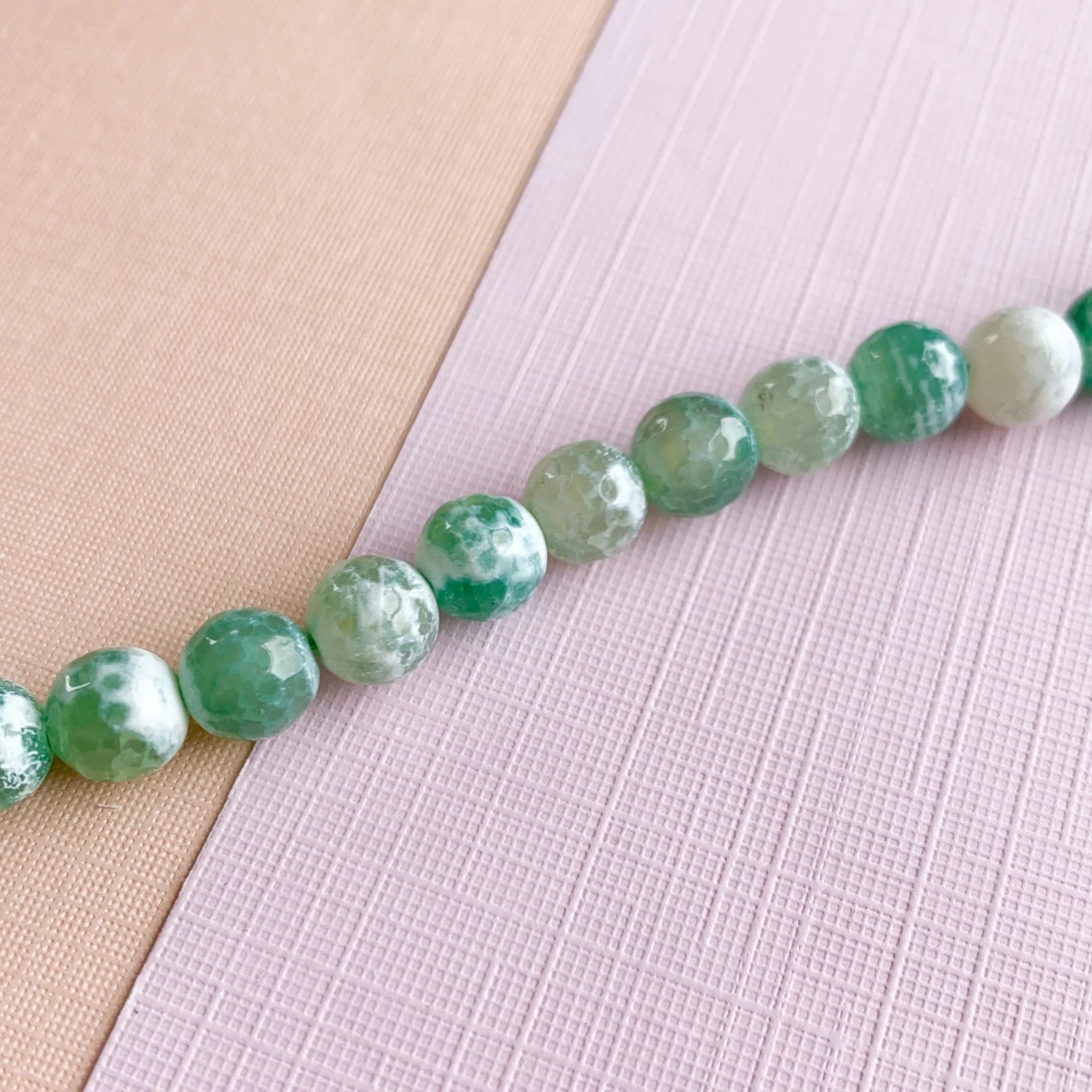 8mm Gulf Agate Faceted Round Strand - Image 3