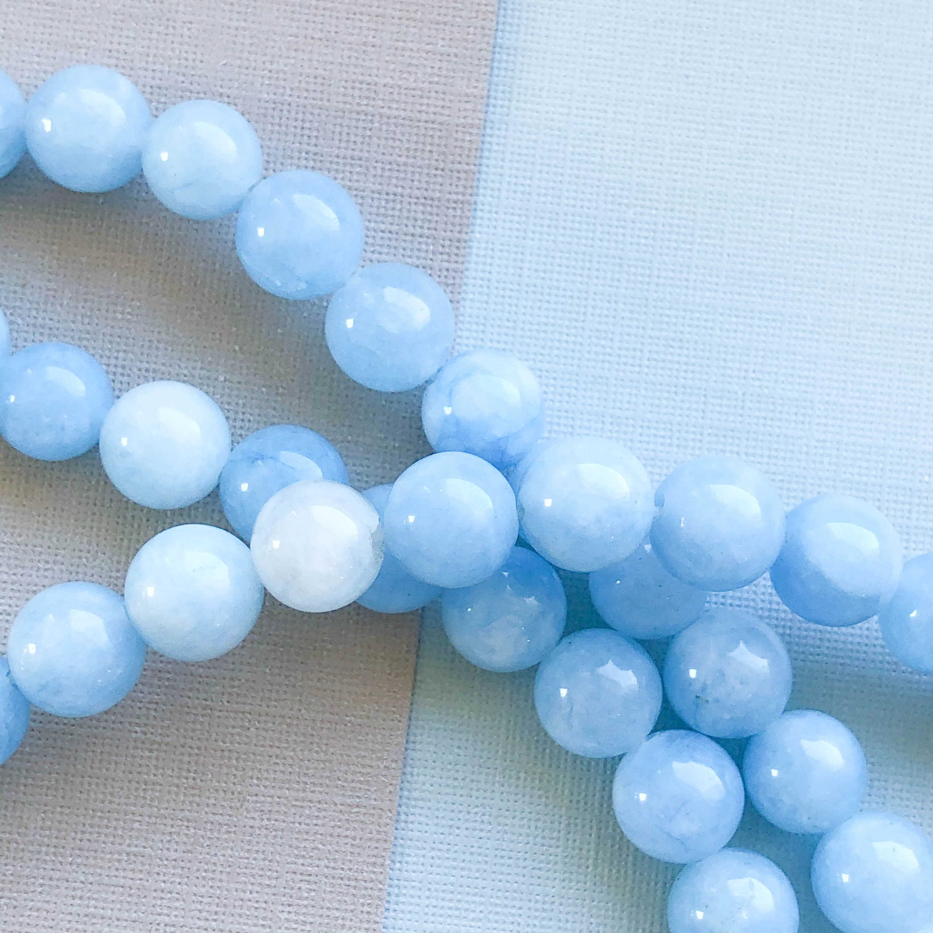8mm Icy Blue Dyed Jade Rounds Strand - Image 2