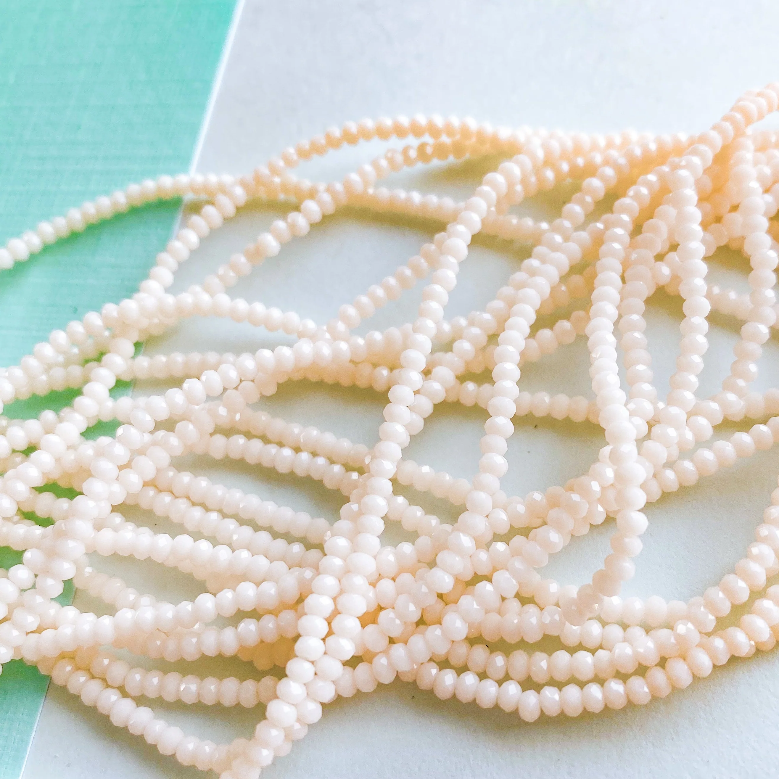 2mm Opaque Blush Faceted Chinese Crystal Rondelle Strand - Image 3