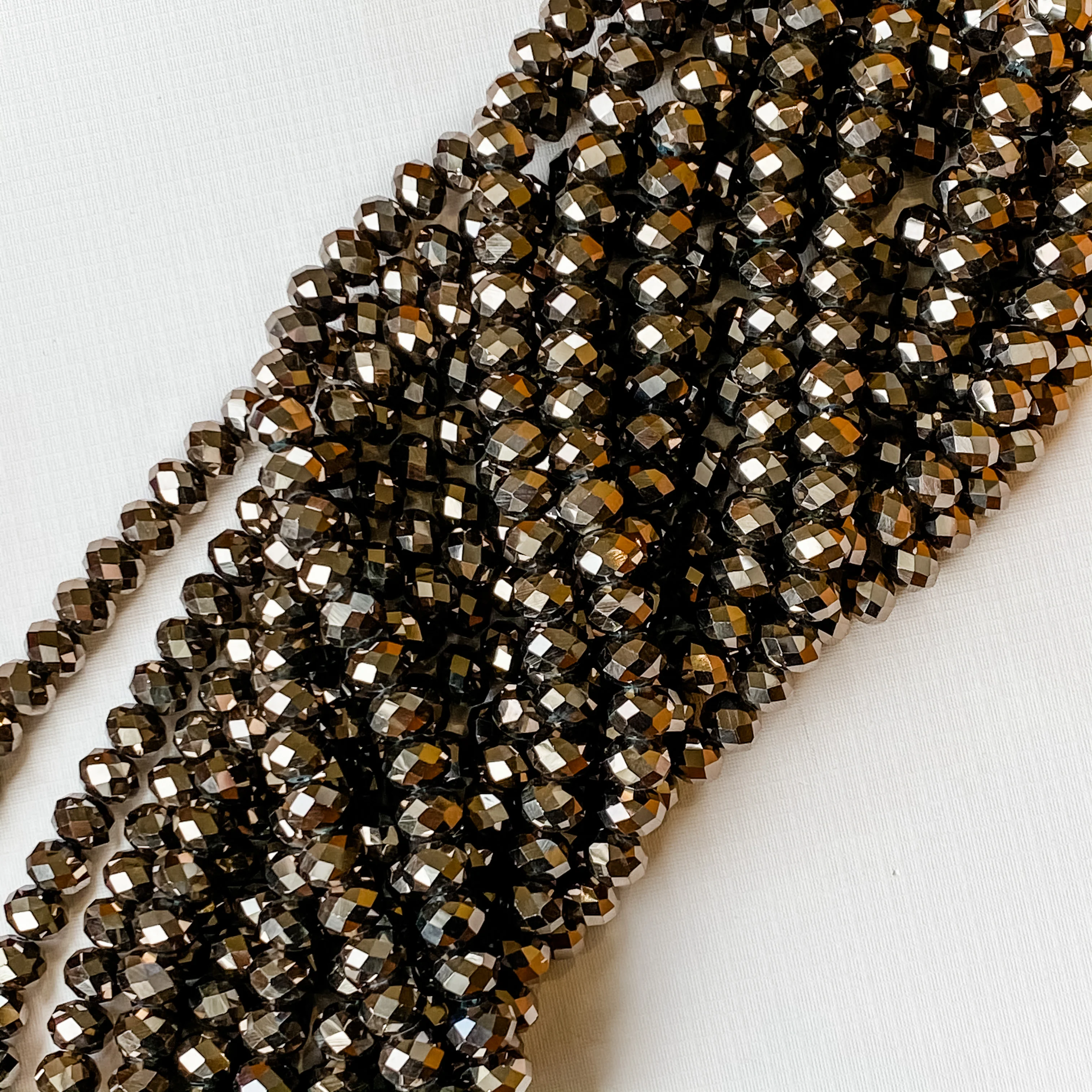 8mm Metallic Ore Faceted Crystal Rondelle Strand - Image 2