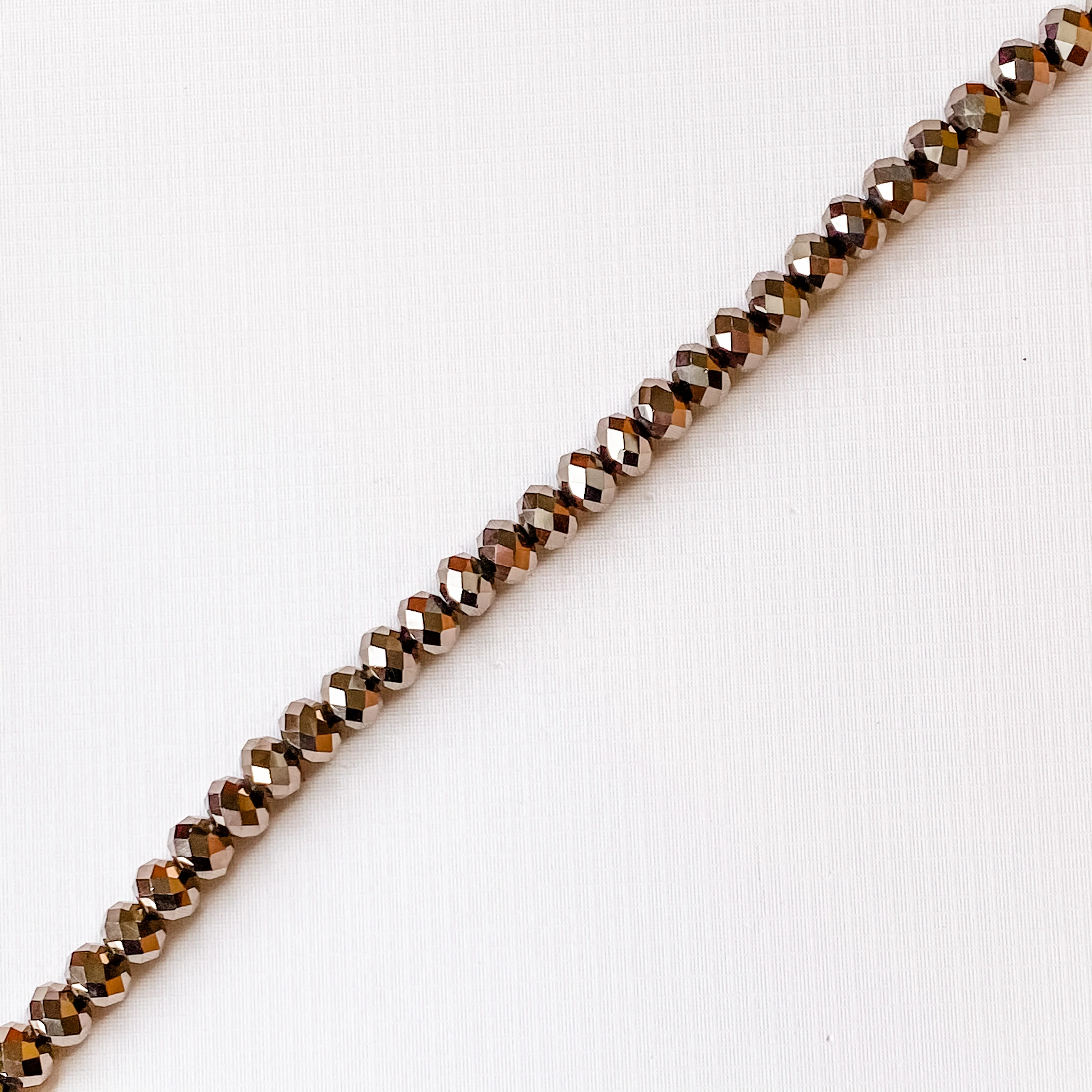 8mm Metallic Ore Faceted Crystal Rondelle Strand - Image 3